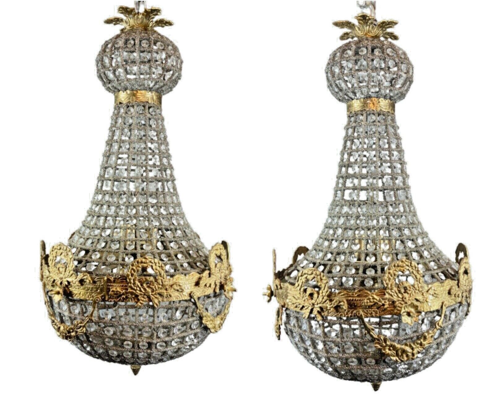 Pair of Vintage French Louis XVI Chandeliers: Bronze with Gold Leaf Accents