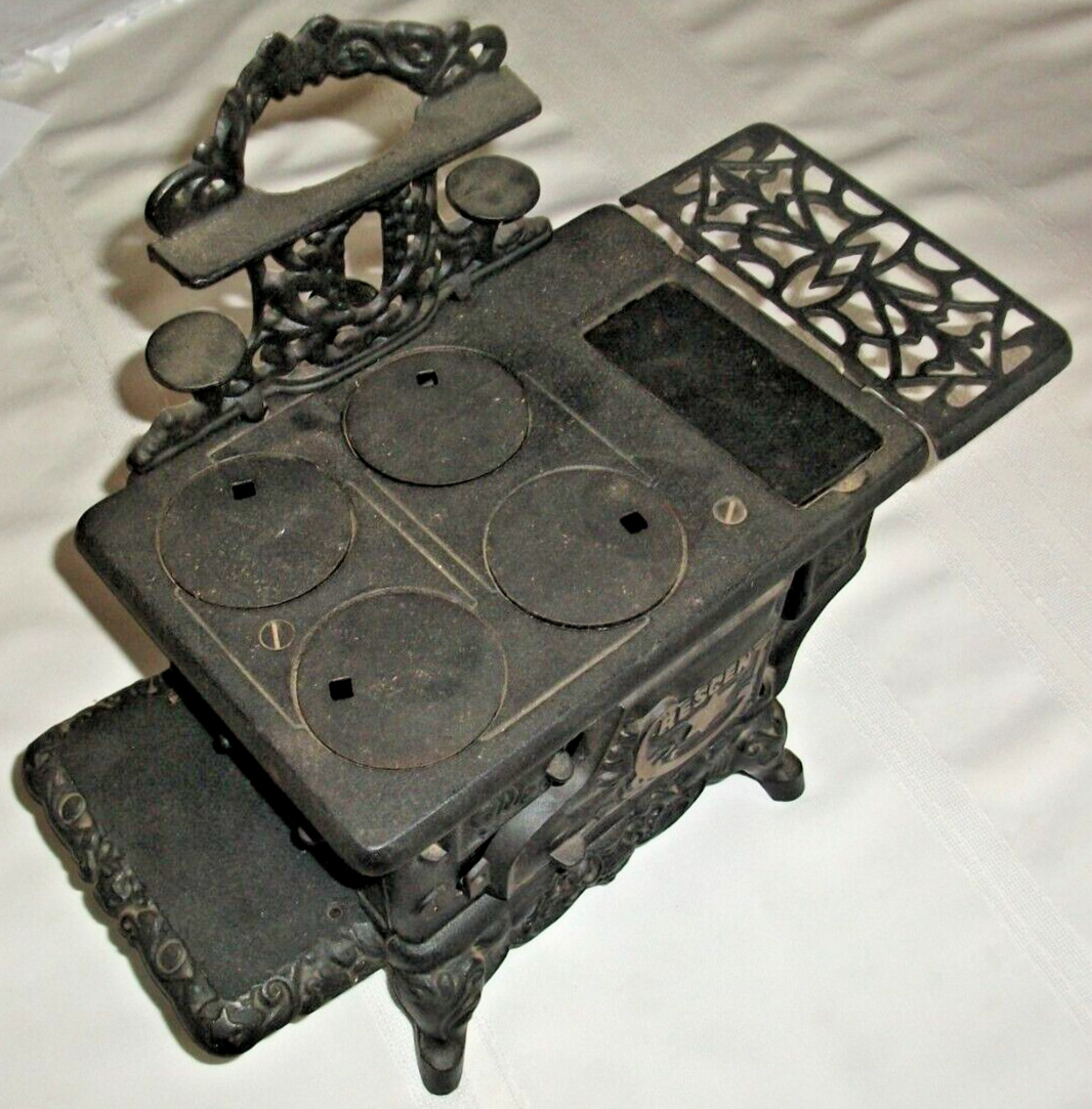 Vintage Crescent Cast Iron Toy Stove With Accessories 10\