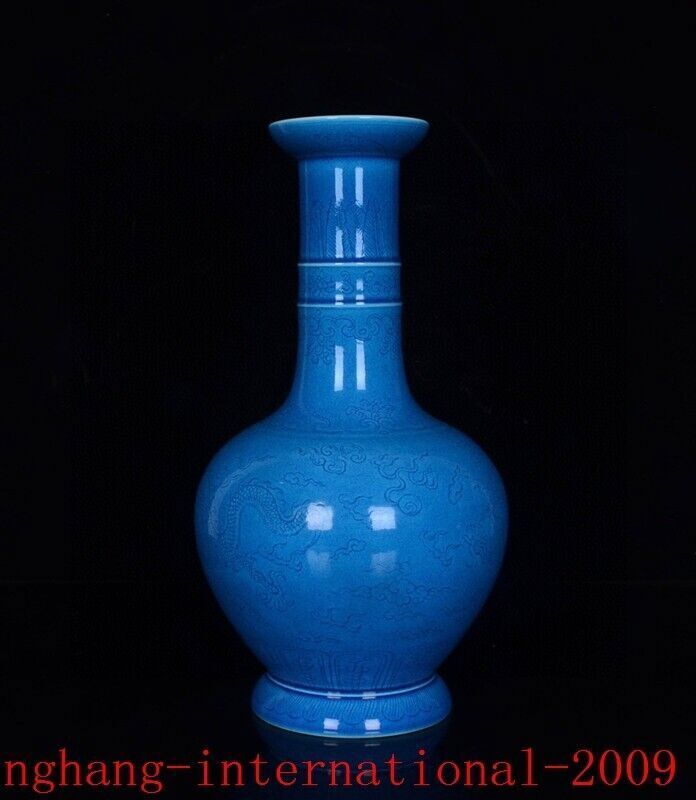 China Qing Peacock blue glaze porcelain exquisite dragon cloud grain bottle vase
