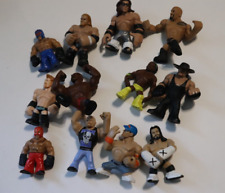 WWE Rumblers Lot of 12 Cena Mysterio Undertaker HHH The Rock picture