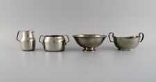 Just Andersen (1884-1943), Denmark. Art Deco pewter creamer and three bowls. picture