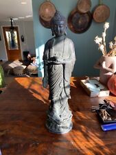 Beautiful tall antique buddha statue with lotus picture