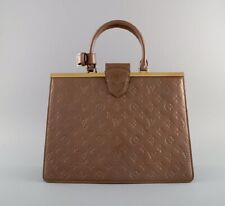 Louis Vuitton. Light chocolate handbag with monograms. Approx. 2000. picture