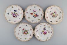 Five antique Meissen porcelain plates with hand-painted flowers. picture