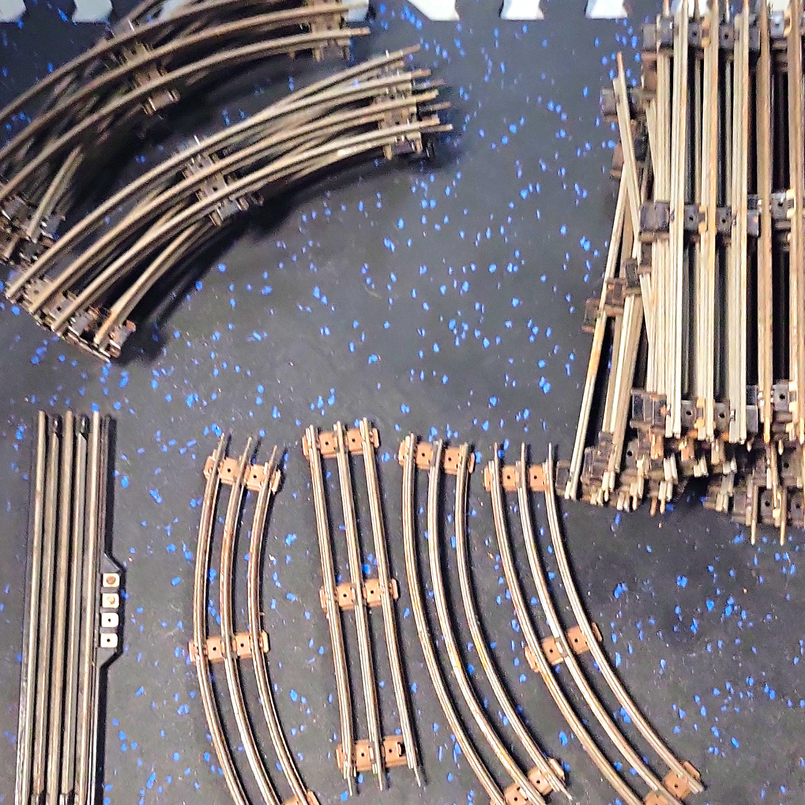 Lionel O Gauge Three-Rail Tracks, Cars And Parts. Lionel O Gauge Three-Rail Tracks, Cars And Parts.