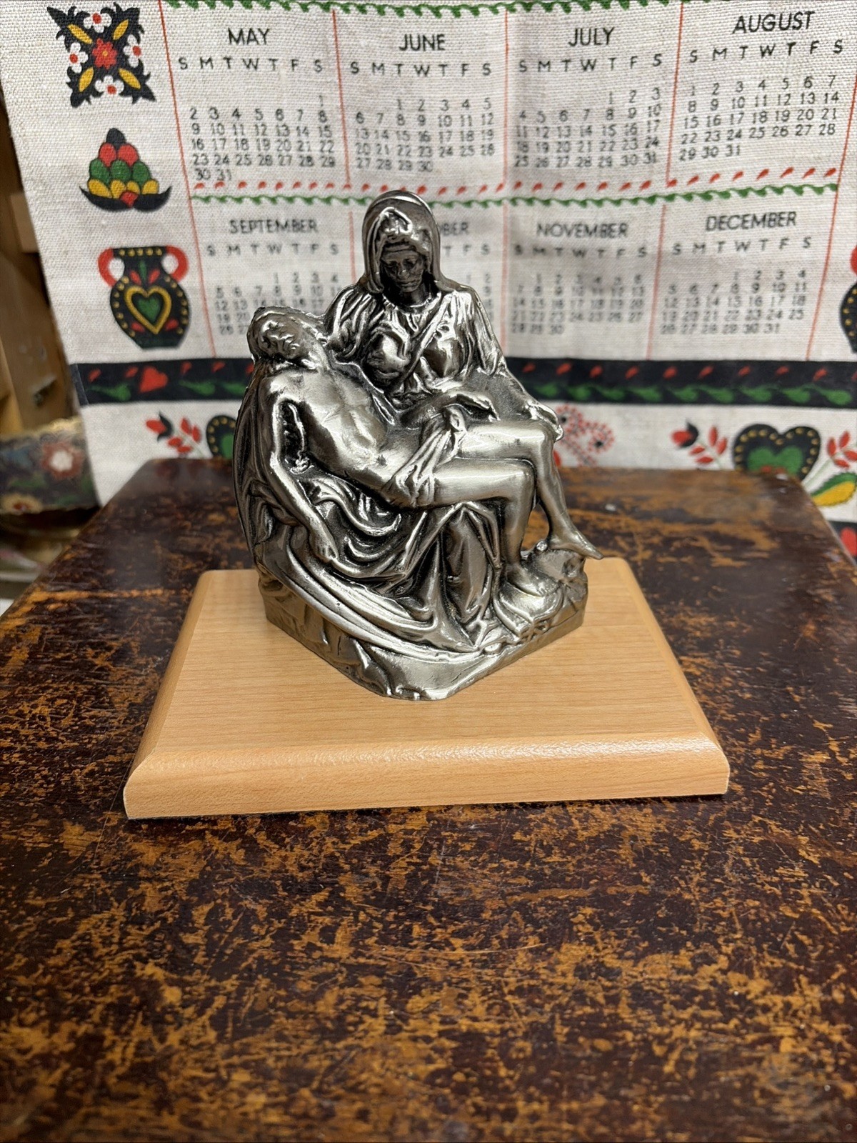 The Pieta by Michelangelo Jesus Christ and Mother Mary statue on wood base