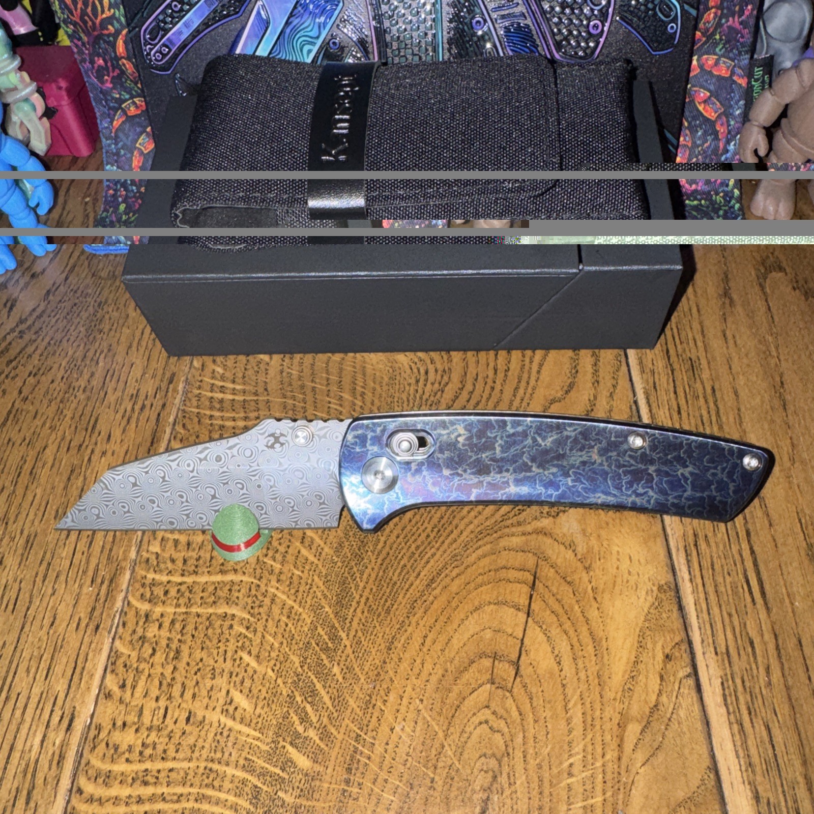 Kansept Main Street Damascus Blade. Titanium Lightning Strike Handle. Bar Lock.
