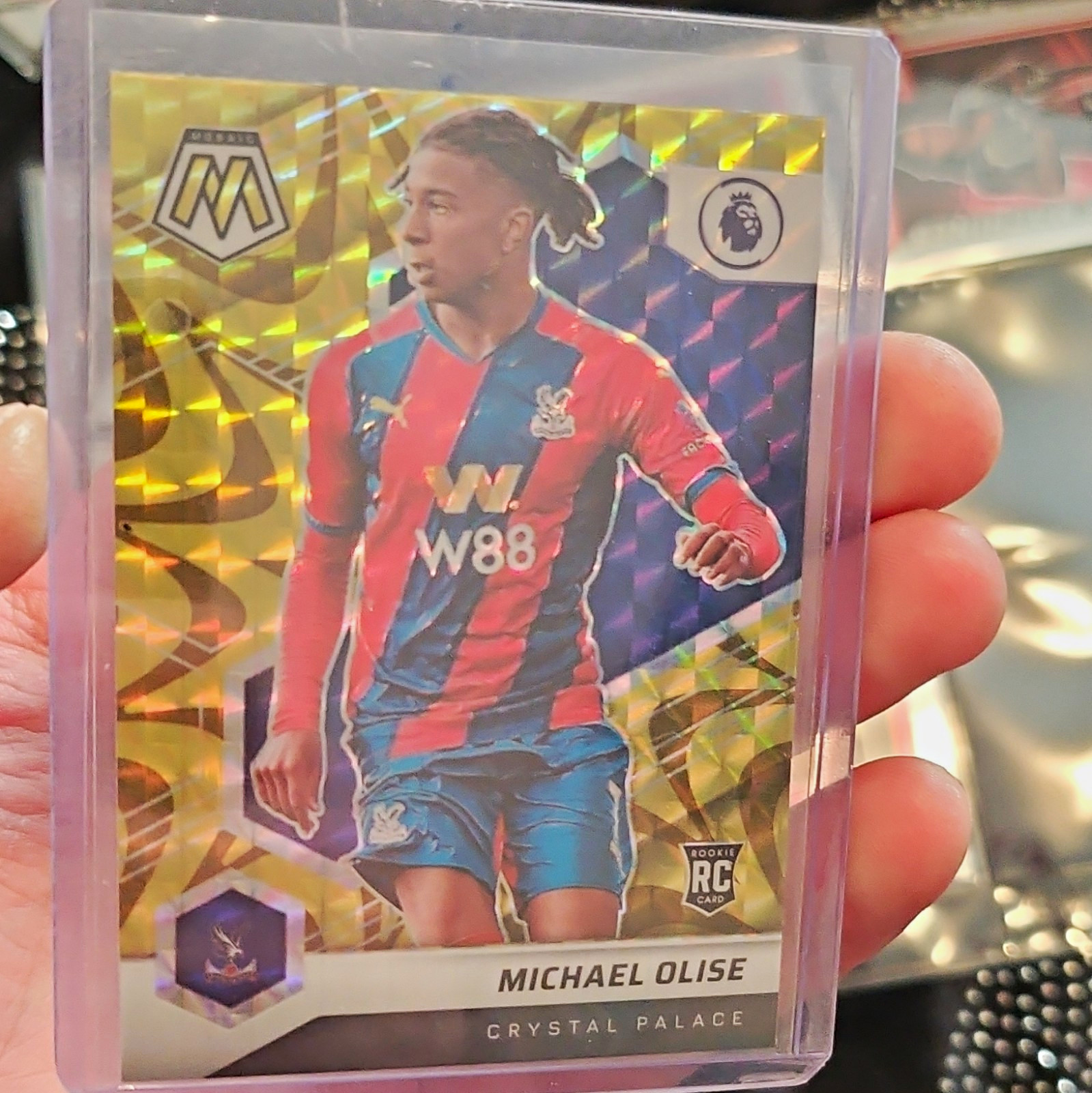 Panini 2021-22 Mosaic Premier League Reactive Gold Prizm Michael Olise RC #136 Panini 2021-22 Mosaic Premier League Reactive Gold Prizm Michael Olise RC #136