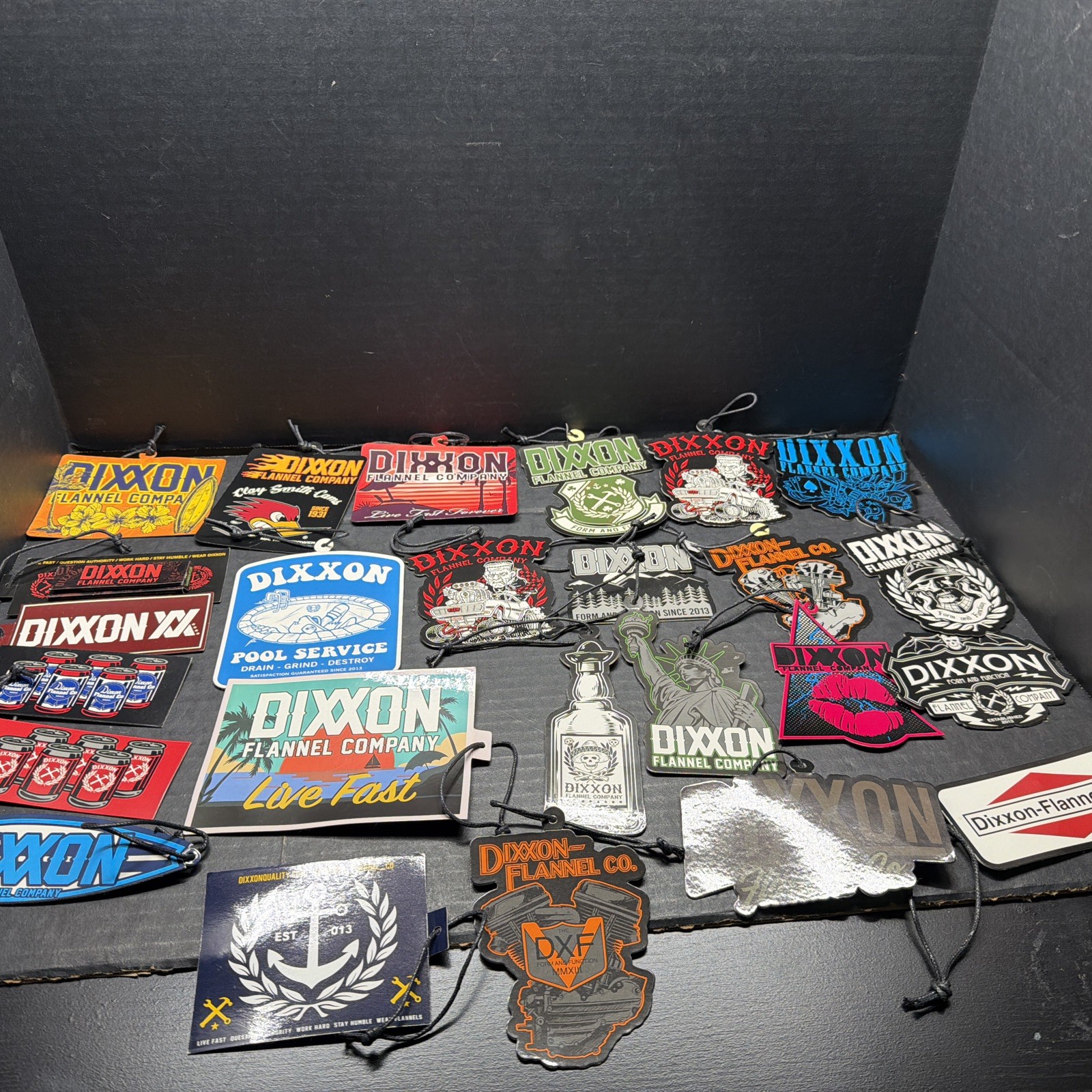 DIXXON FLANNEL TAG/STICKER LOT OF 25
