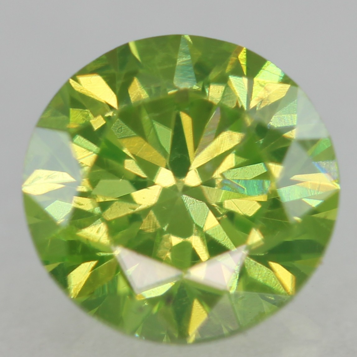 Cert 0.54 Carat Vivid Green VVS2 Round Brilliant Natural Enhanced Diamond 5.06mm