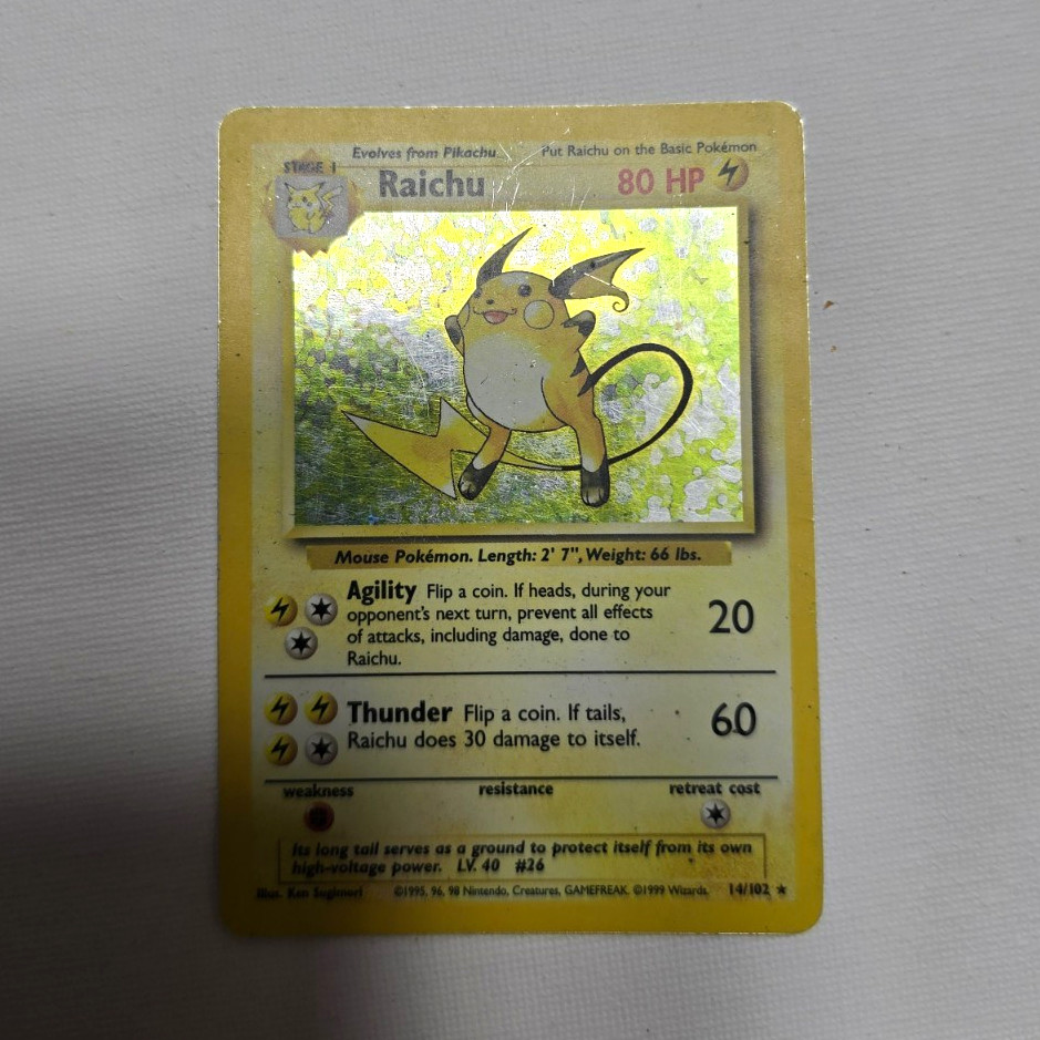 Wizards of the Coast Pokemon TCG Raichu 14/102 Base Set Holo Rare English 1999