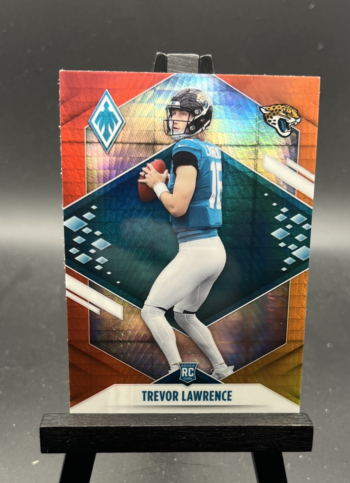 2021 Panini Phoenix - Rookie Trevor Lawrence #101 Fire Burst (RC) Jaguars 2021 Panini Phoenix - Rookie Trevor Lawrence #101 Fire Burst (RC) Jaguars