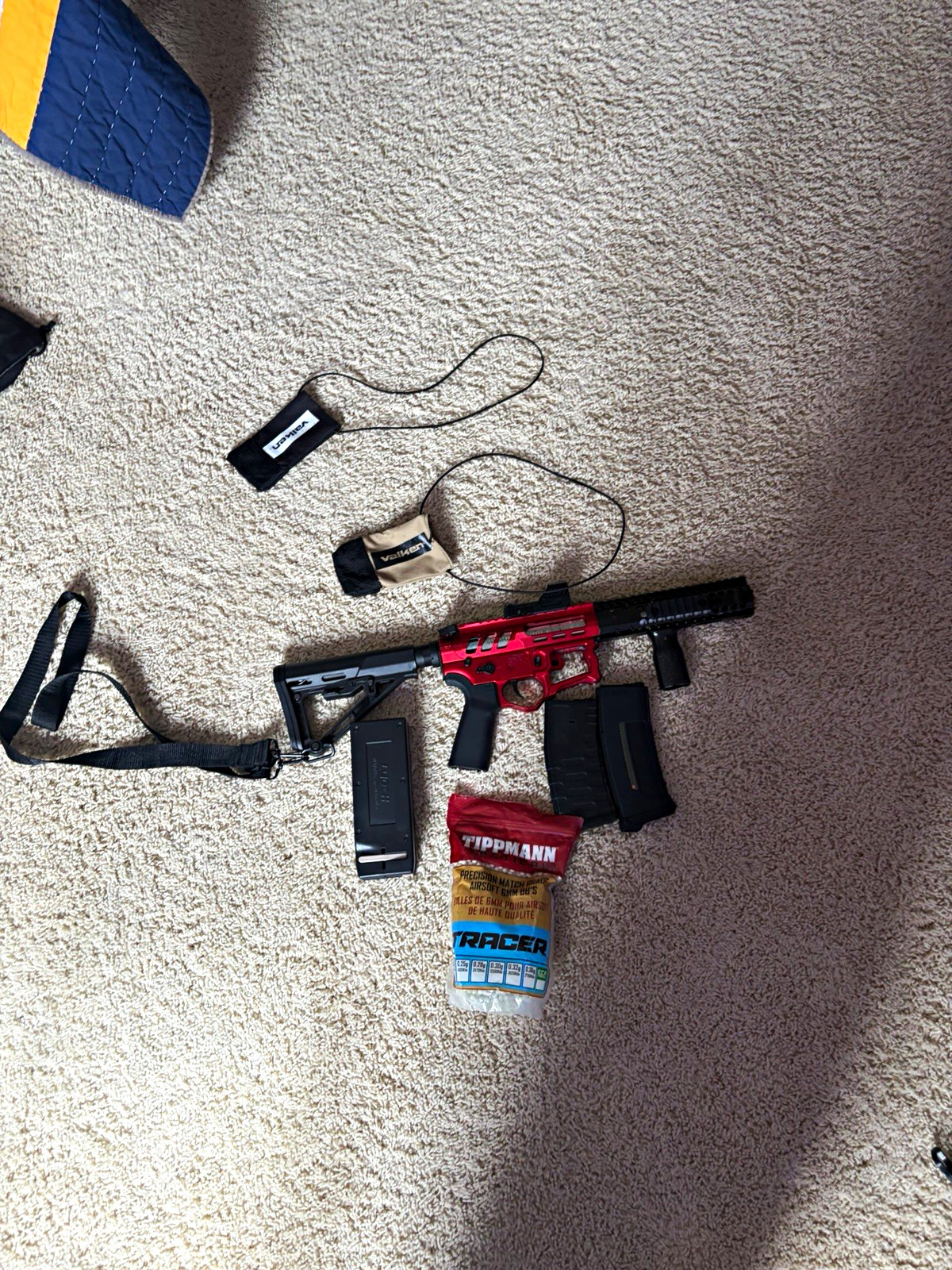 Pre-owned airsoft setup in red and black. Comes with the airsoft items