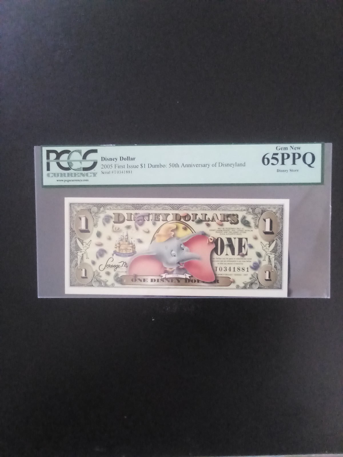 Disney Dollars 2005T $1 Dumbo (no bar code) PCGS 65 Gem New Disney Dollars 2005T $1 Dumbo (no bar code) PCGS 65 Gem New
