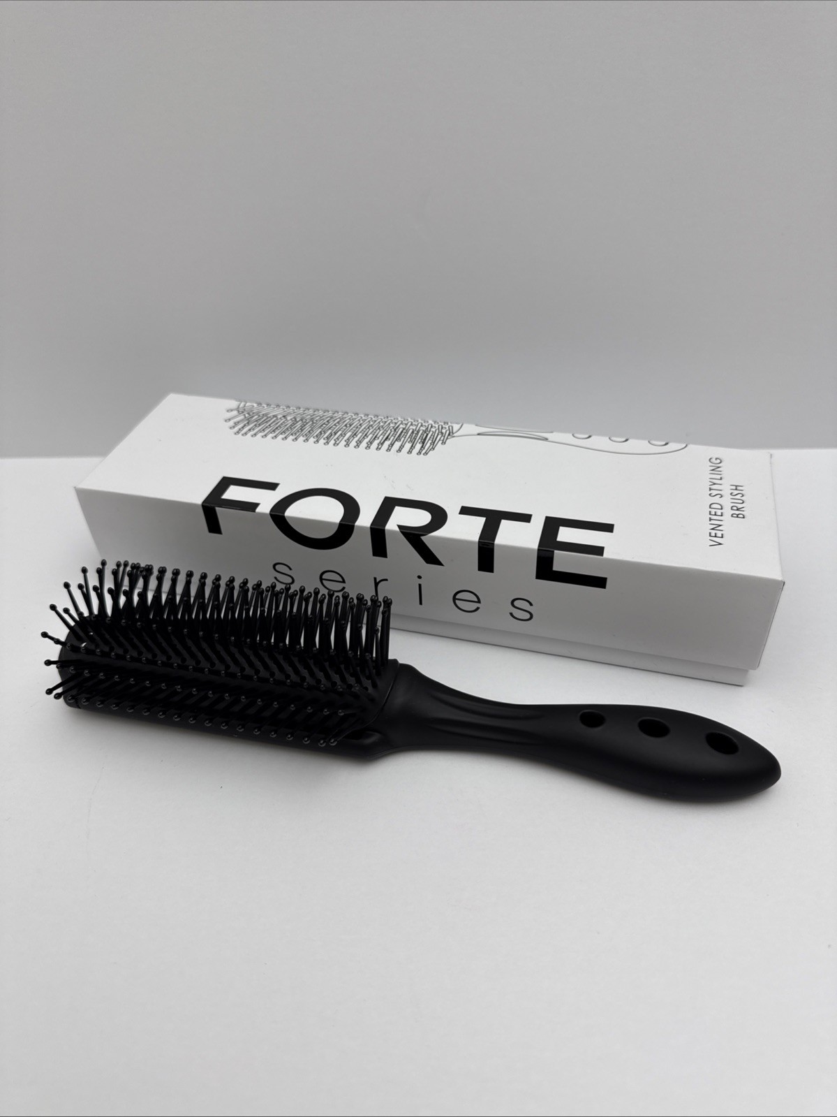 Forte Series Vented Styling Brush with 9 Rows of Firm Bristles (Black) Forte Series Vented Styling Brush with 9 Rows of Firm Bristles (Black)
