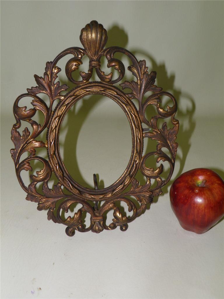 ANTIQUE ORNATE BRONZED OVAL EASEL BACK PICTURE FRAME
