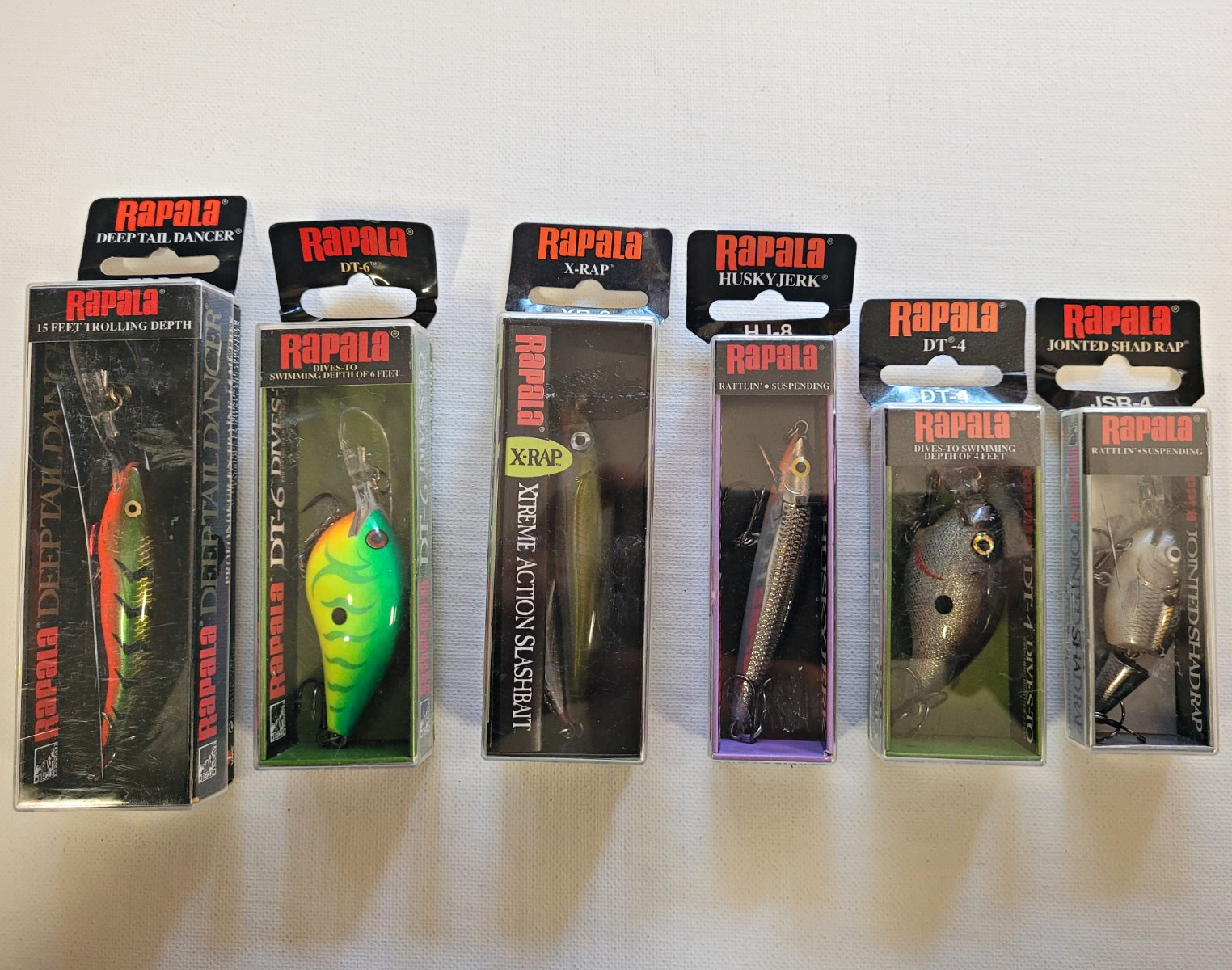 RAPALA Lot of 6 Asst Lures DT Deep Tail Dancer X-Rap Husky Jerk Shad Rap NOS RAPALA Lot of 6 Asst Lures DT Deep Tail Dancer X-Rap Husky Jerk Shad Rap NOS