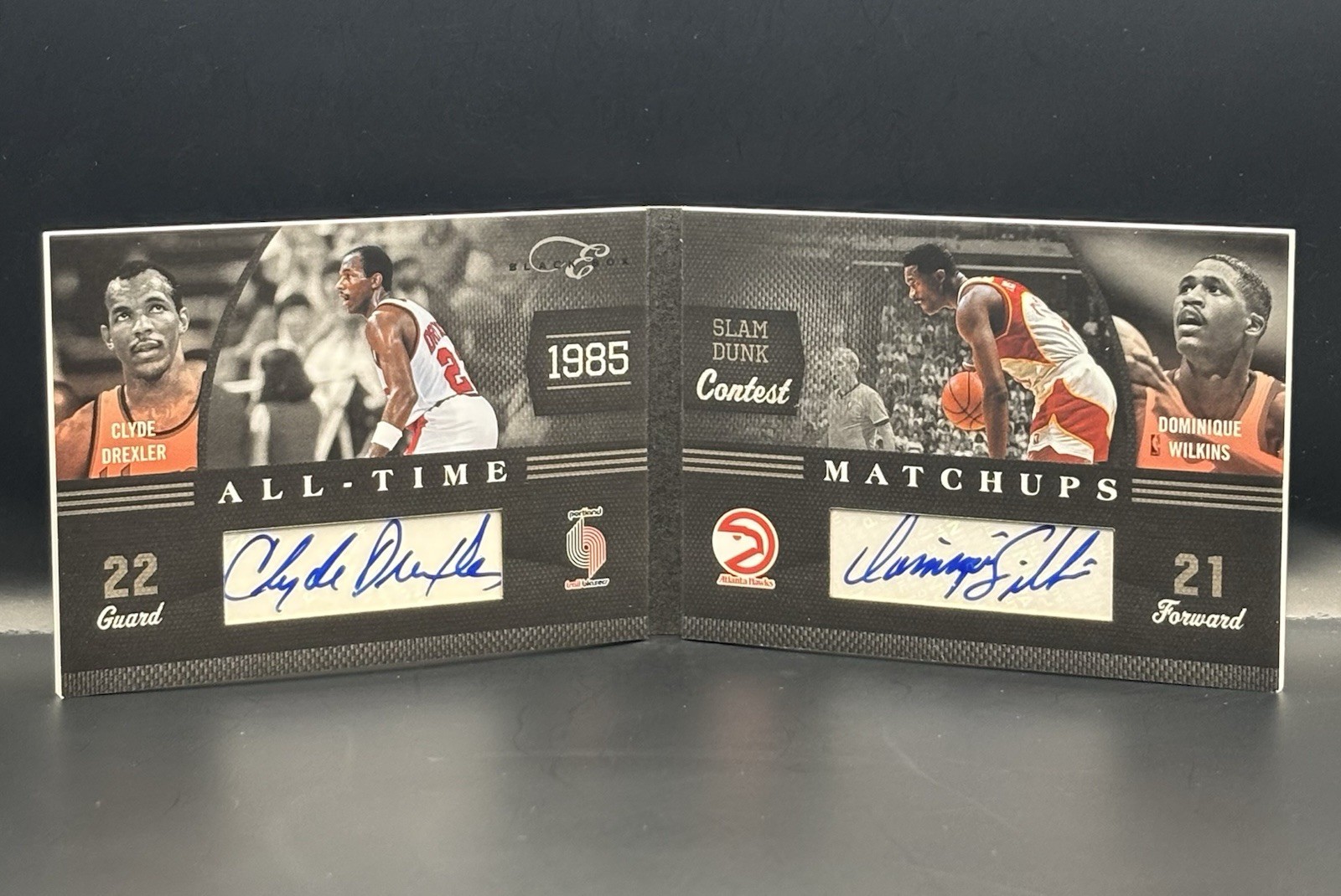 2010-11 Panini Clyde Drexler Dominique Wilkins /25 Booklet Dual Auto #4 2010-11 Panini Clyde Drexler Dominique Wilkins /25 Booklet Dual Auto #4