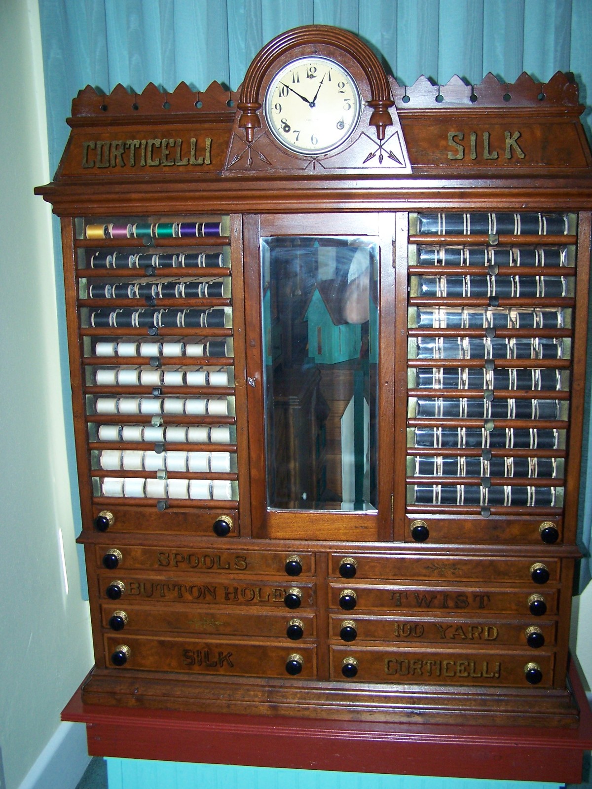 vintage antique spool cabinet