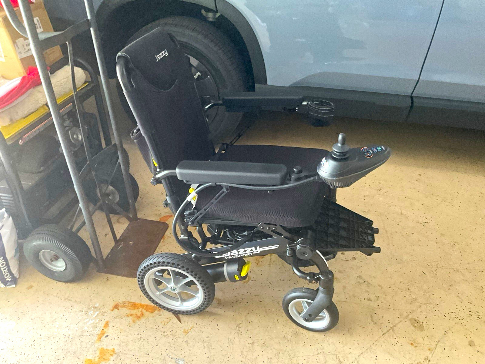 Pride Jazzy Passport Power Wheelchair Black 4-Wheel w/ Joystick Control Footrest Pride Jazzy Passport Power Wheelchair Black 4-Wheel w/ Joystick Control Footrest