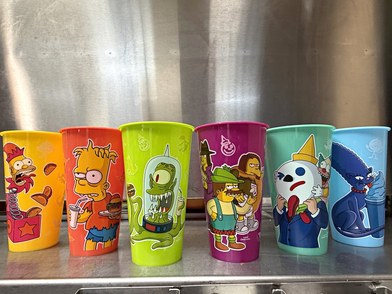The Simpsons 16 fl oz Decorated Plastic Cold Cups Set of 6, Multicolor The Simpsons 16 fl oz Decorated Plastic Cold Cups Set of 6, Multicolor