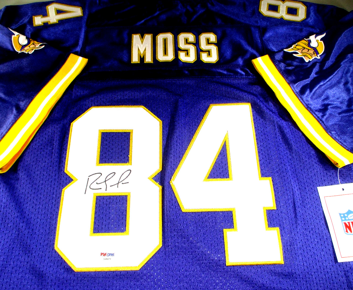 Randy Moss / Autographed Minnesota Vikings N&M Throwback Football Jersey / PSA