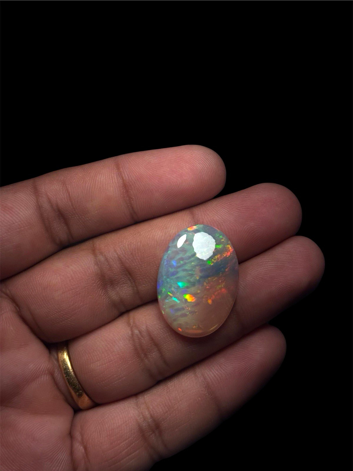 Natural Ethiopian Multicolor Opal Oval Cabochon 28.51x20.45x7.6mm Natural Ethiopian Multicolor Opal Oval Cabochon 28.51x20.45x7.6mm