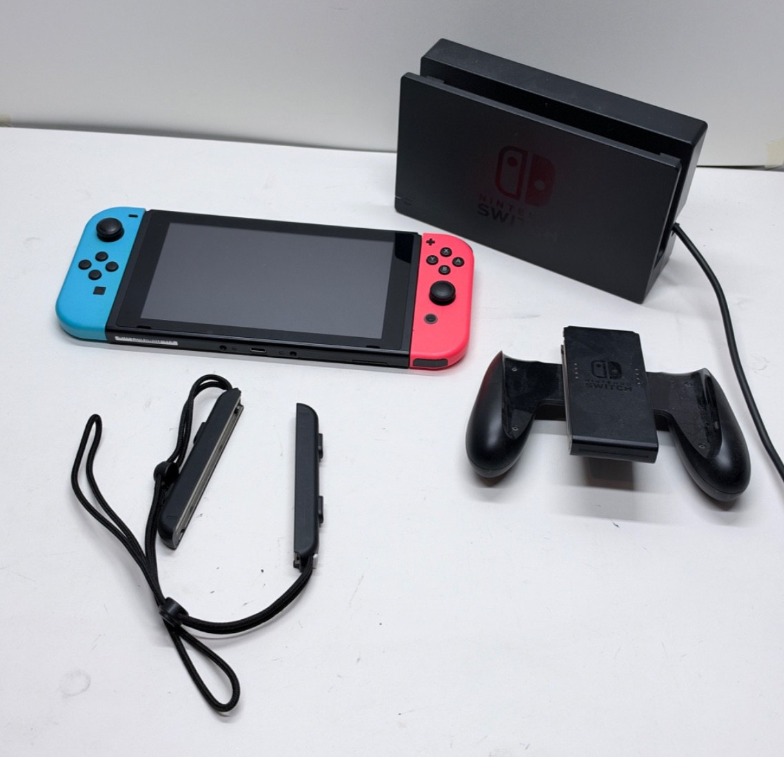 Nintendo Switch Console HAC-001 Neon Red Blue Joy-Con Dock Charger Grip Nintendo Switch Console HAC-001 Neon Red Blue Joy-Con Dock Charger Grip