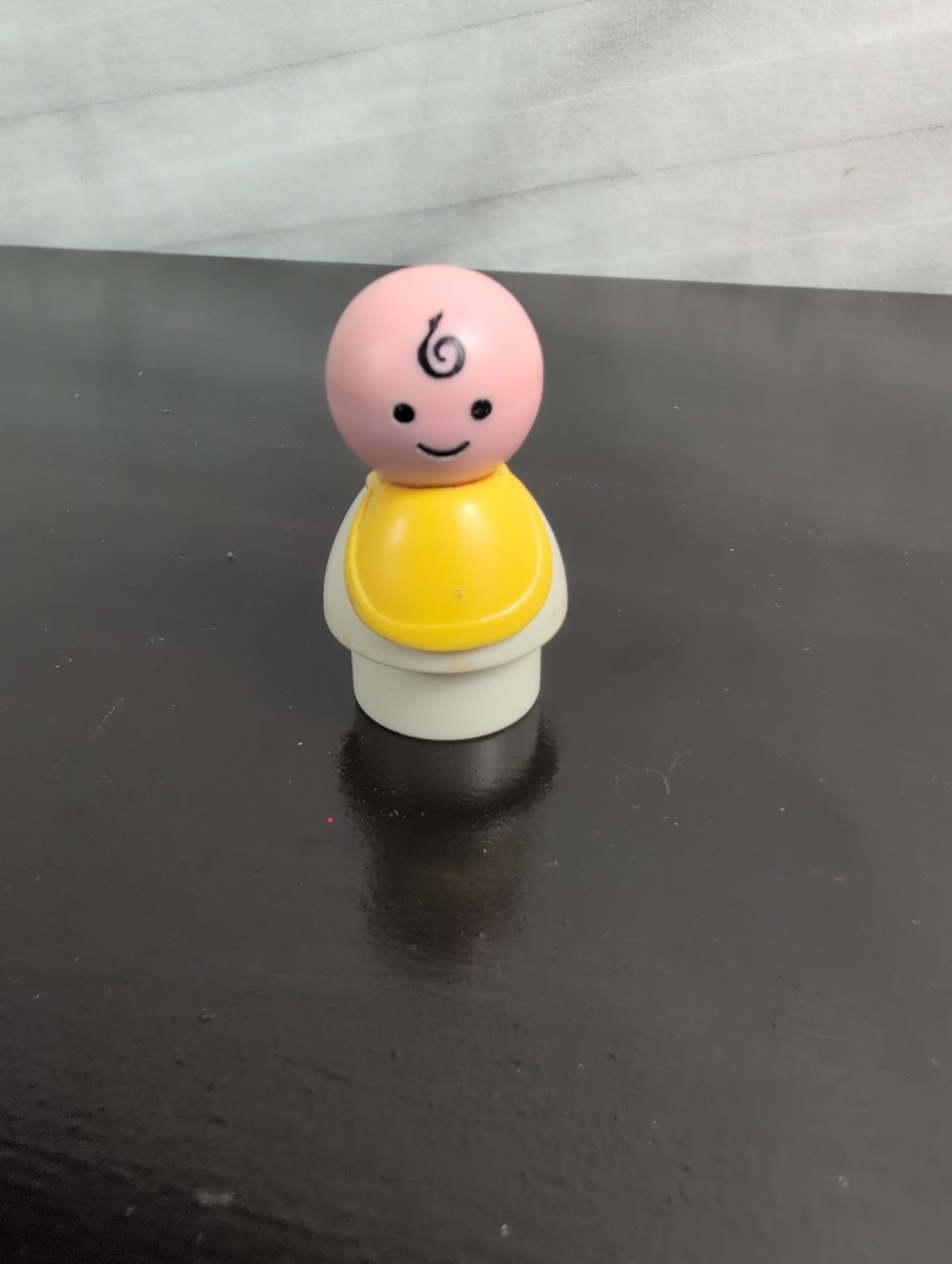 Vintage Fisher Price little people white baby 👶 with yellow bib 