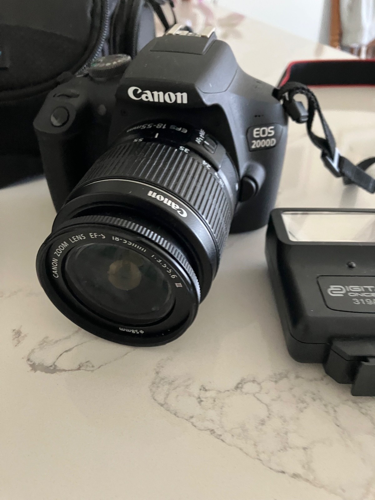 Canon EOS-2000D 24.1MP DSLR Camera - Black (Kit with EF-S 18-55mm IS II Lens) Canon EOS-2000D 24.1MP DSLR Camera - Black (Kit with EF-S 18-55mm IS II Lens)