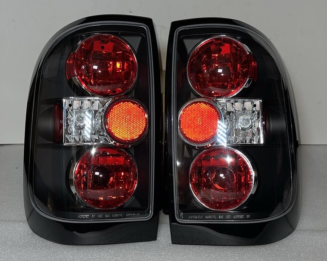 96-04 Nissan Pathfinder / 97-04Infiniti QX4 Black Housing Tail Lights 96-04 Nissan Pathfinder / 97-04Infiniti QX4 Black Housing Tail Lights