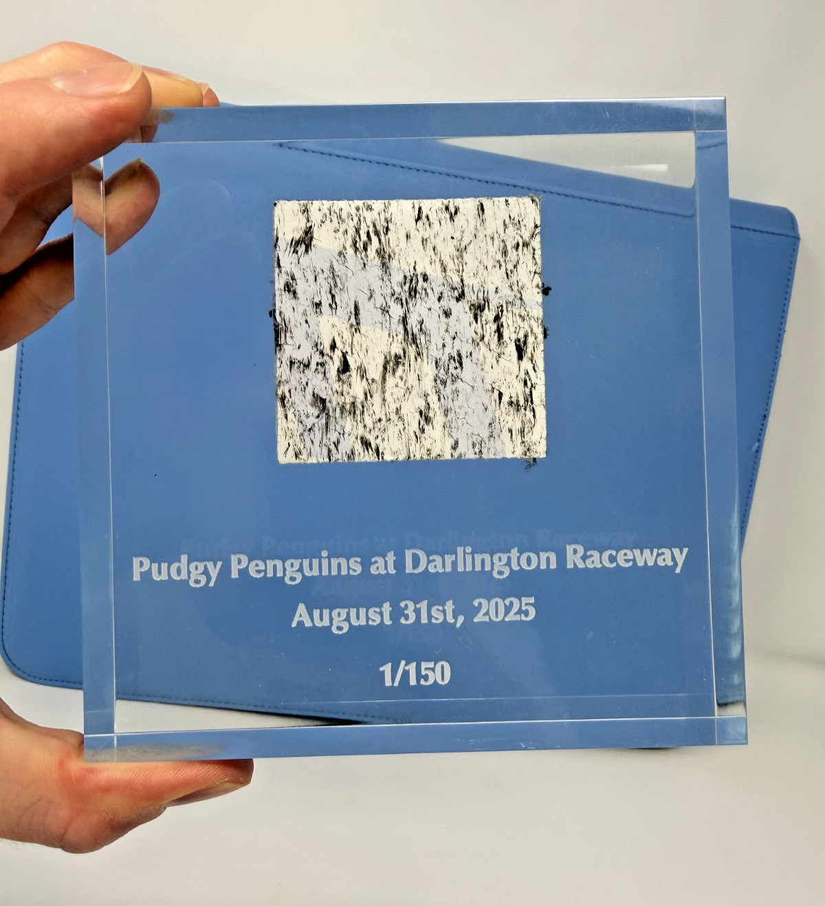 PIECE OF RICKY STENHOUSE JR.\'S NO. 47 PUDGY PENGUINS RACE CAR DARLINGTON RACEWAY PIECE OF RICKY STENHOUSE JR.\'S NO. 47 PUDGY PENGUINS RACE CAR DARLINGTON RACEWAY