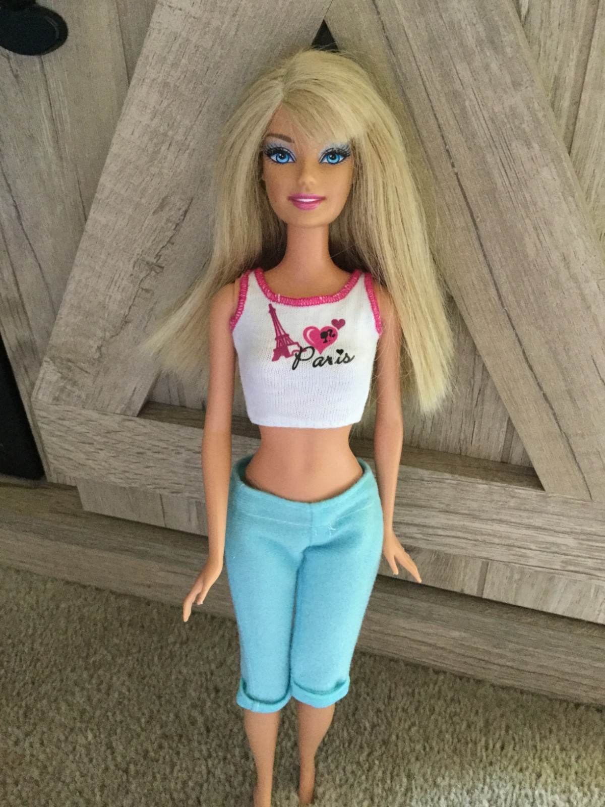 2009 Mattel Barbie Paris Fashions #T4896 Barbie Doll White Top Light Blue Pants
