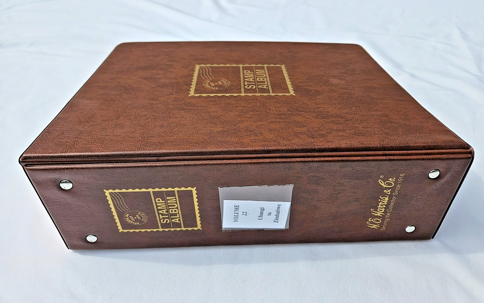 Harris Worldwide Stamp Album w/ Stamps Uganda Ukraine Vatican City Vietnam Zaire