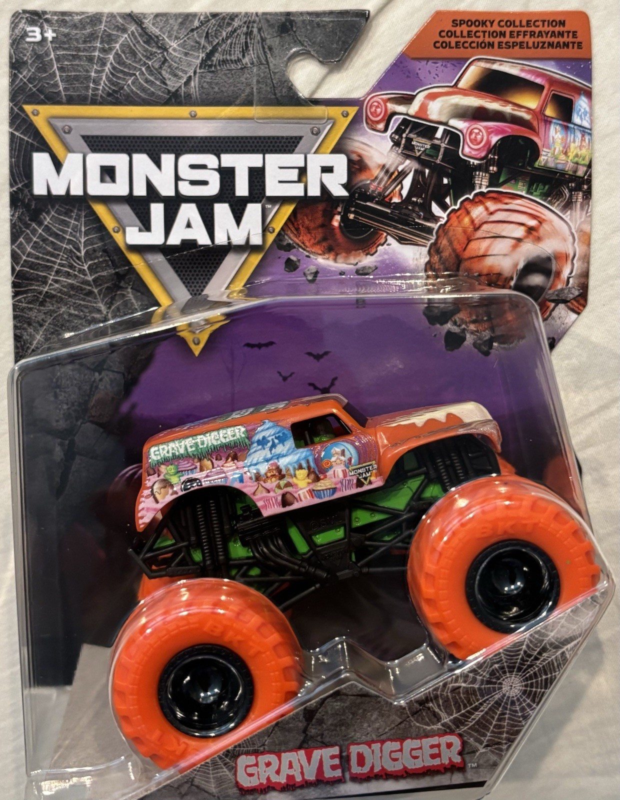 SPIN MASTER MONSTER JAM SPOOKY COLLECTION GRAVE DIGGER TRUCK with Orange Tires
