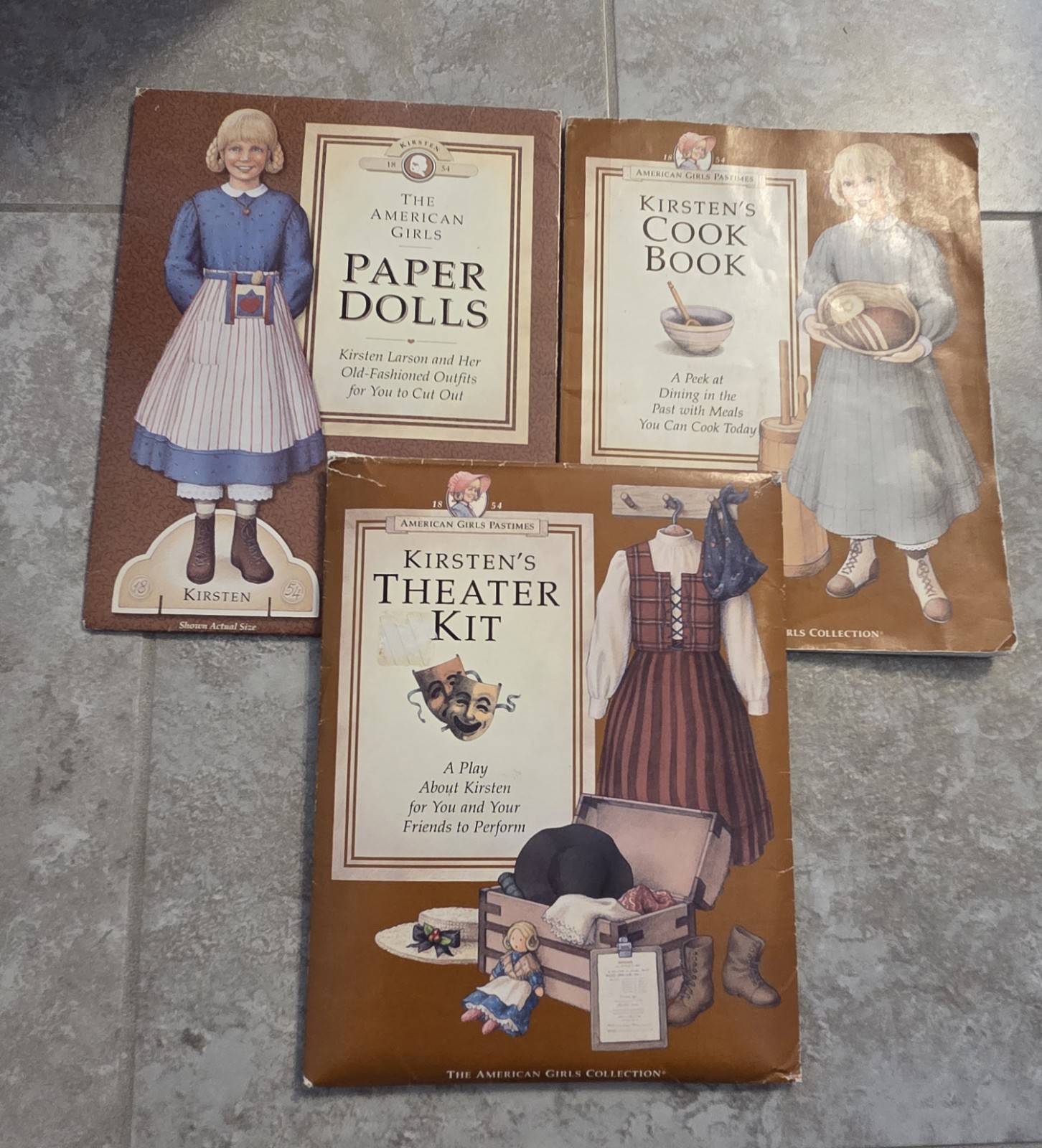 American Girls Kirsten\'s Cookbook, Theater Set and Paper Doll Set American Girls Kirsten\'s Cookbook, Theater Set and Paper Doll Set