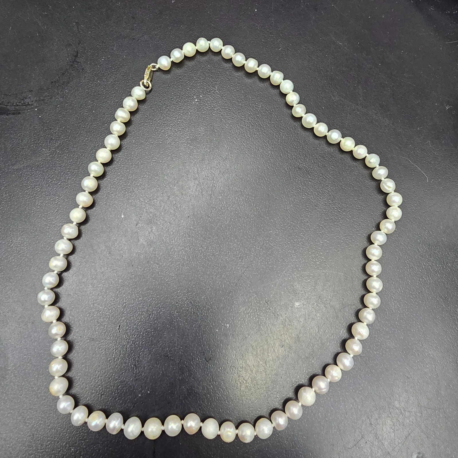 Genuine Freshwater Pearl Handknotted Strand Necklace with Silver Lobster Genuine Freshwater Pearl Handknotted Strand Necklace with Silver Lobster