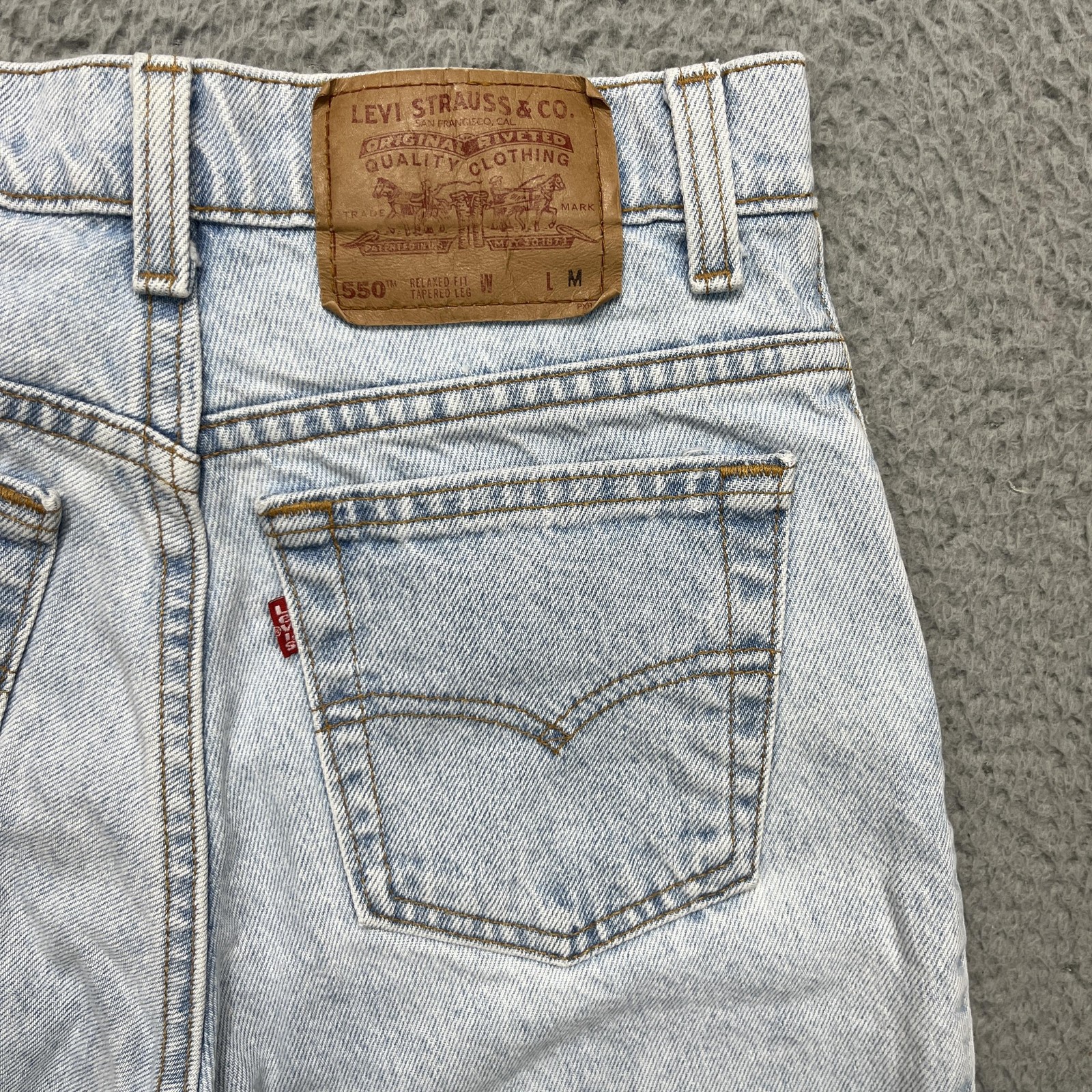 Vintage Levis 550 Jeans Juniors 7 Med Light Wash High Rise Relaxed Taper 90s USA