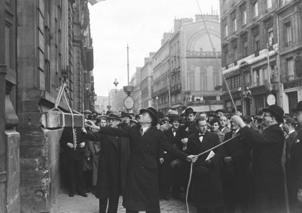 Robert Jardillier dismantling first pillar former Hotel des Poste- 1937 Photo