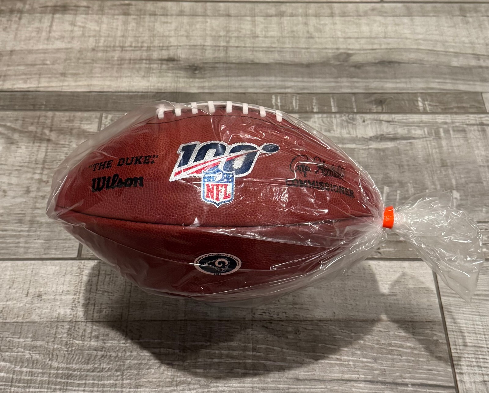 🏈 Own a Piece of Rams History – Mint NFL 100 Game Ball (Polybagged & Authentic