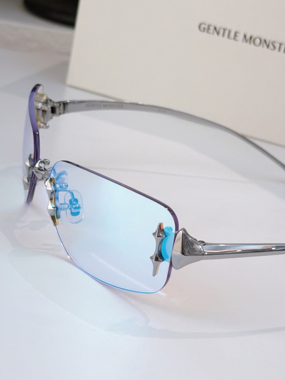 Gentle Monster TTL Sunglasses 64‑14‑145 Rimless Star Decor Blue Lens