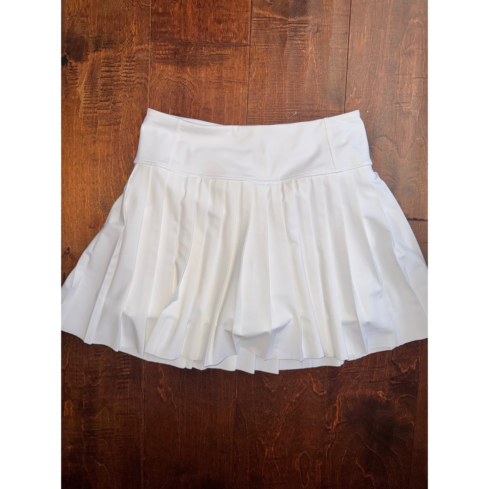 Athleta Elevate Skort White Pleated Skirt XS Pockets Zippered Back Athleta Elevate Skort White Pleated Skirt XS Pockets Zippered Back