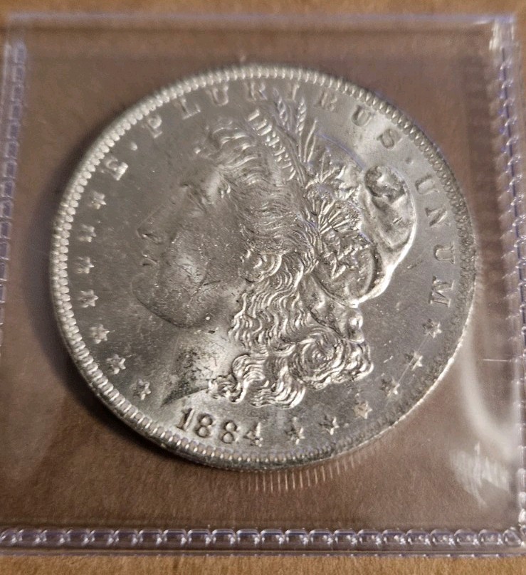 1884 O Morgan Silver Dollar New Orleans Minted 90% Silver Fine-Very Fine