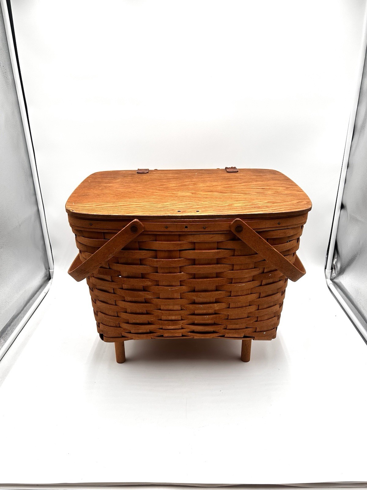 Longaberger Picnic Basket Large Lidded with Stand Signed 1992 16” X 14” X 11” Longaberger Picnic Basket Large Lidded with Stand Signed 1992 16” X 14” X 11”