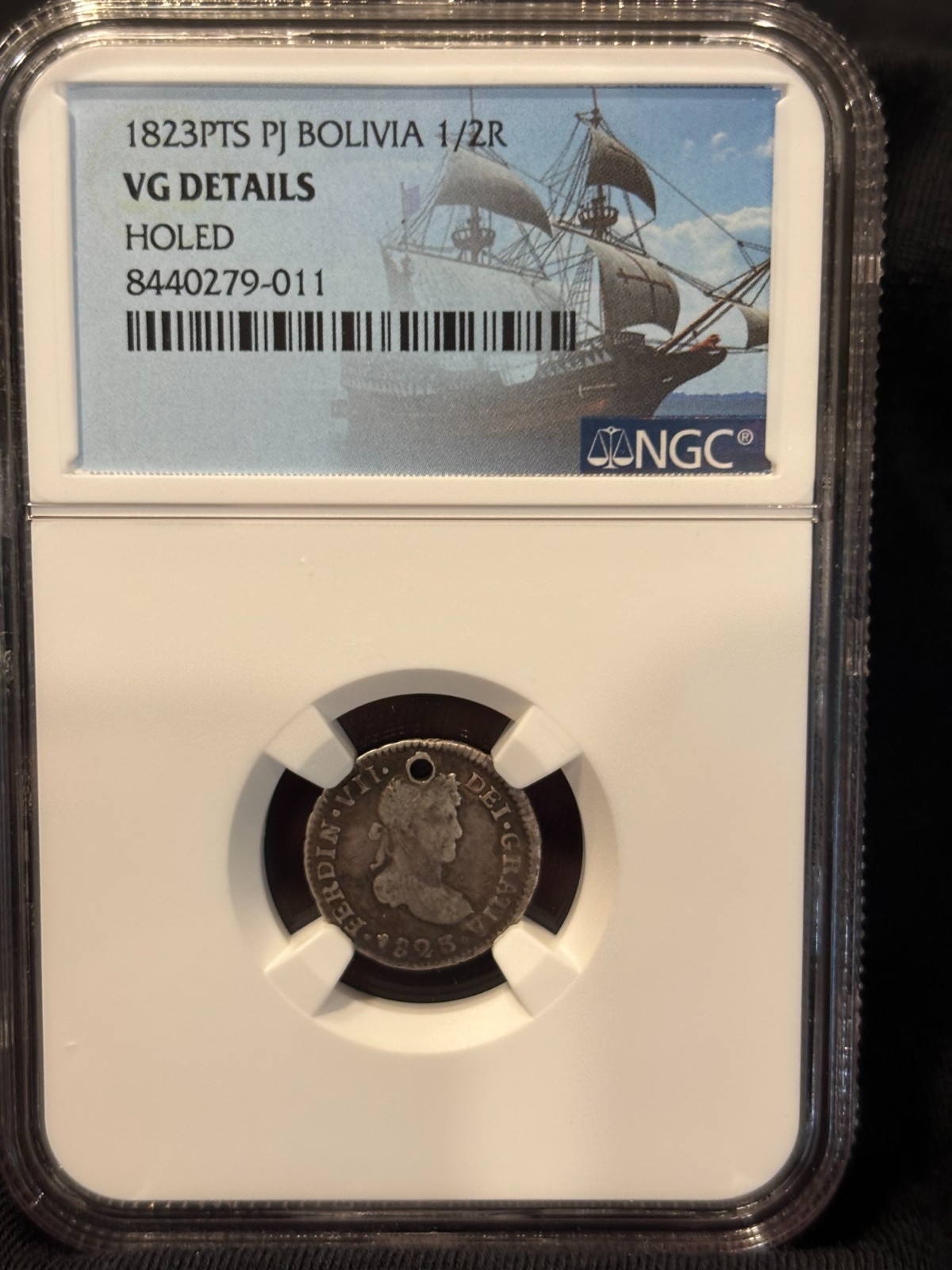 1823 PTS PJ Bolivia 1/2 Reale NGC certified