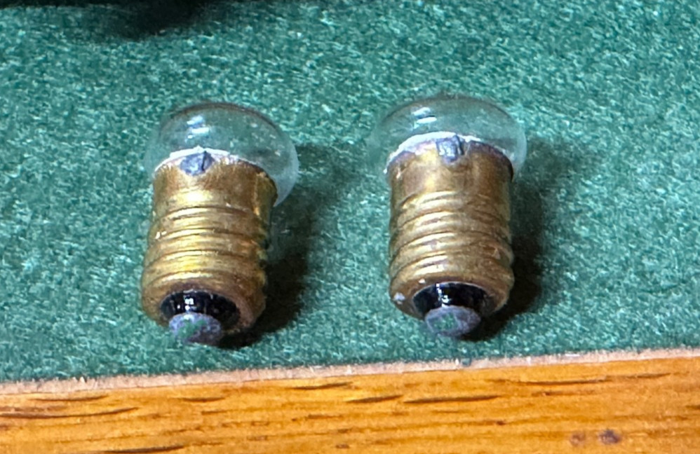 Two Antique Button Bulbs Japan 50\'s Tin Toy Masudaya Robot Gang Nomura Yonezawa