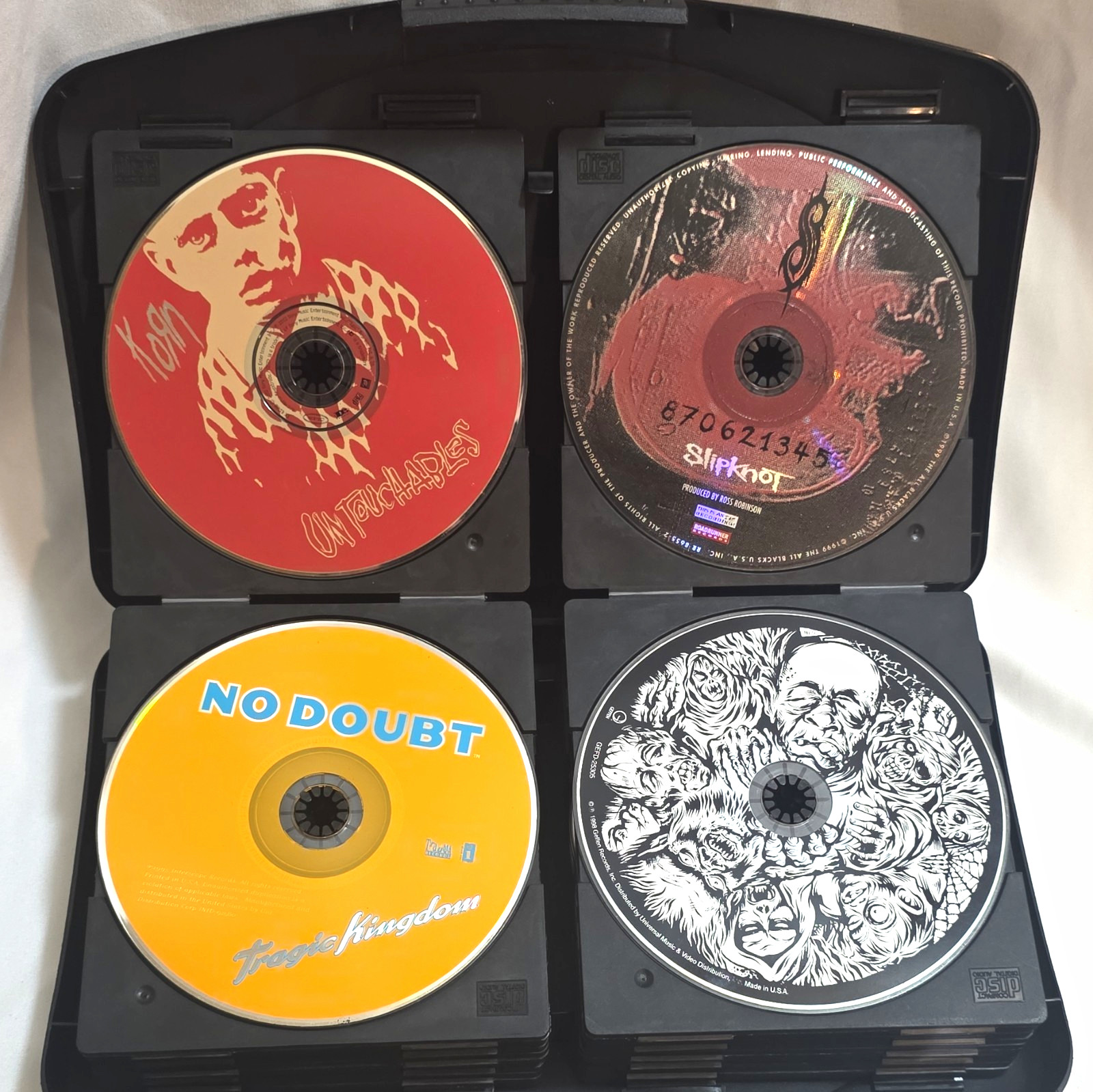 Rock CD Mixed Lot in Laserline Case - Korn, Slipknot, Pearl Jam, No Doubt