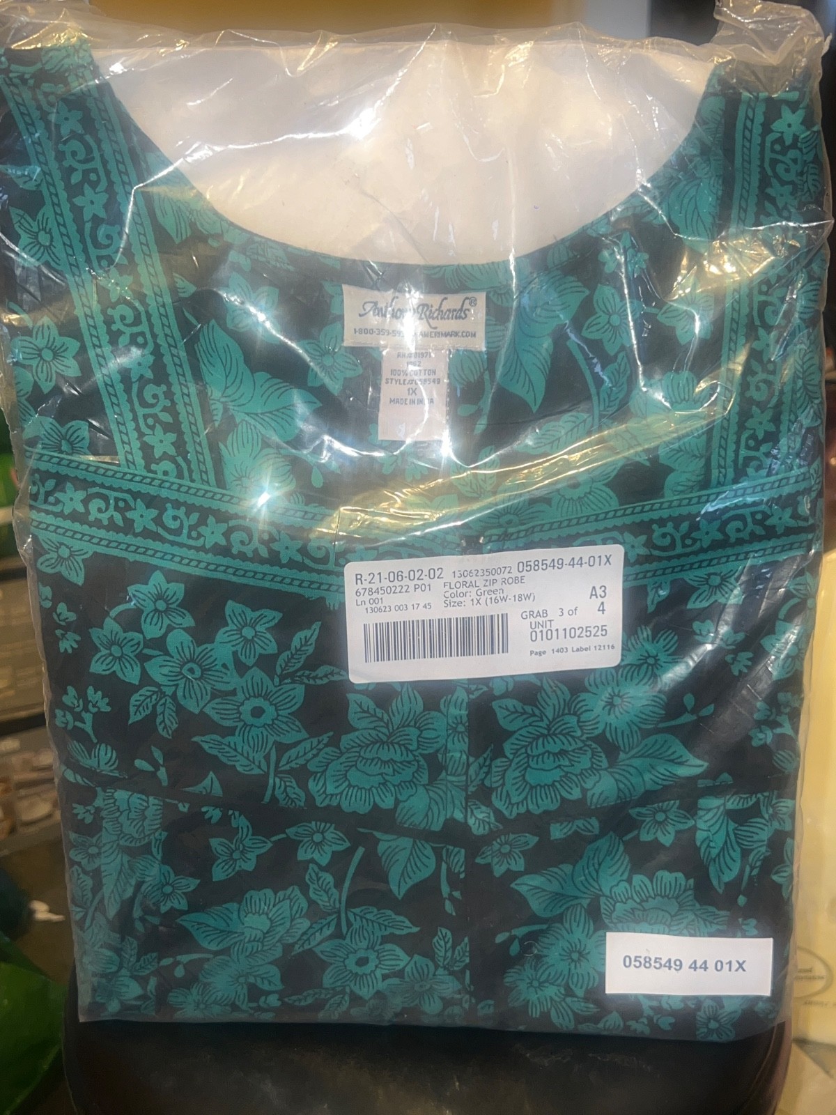 Anthony Richards Zip Robe Is Featured In A Green And Black Floral 1X