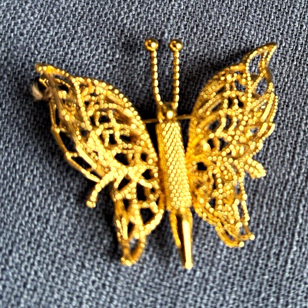 Vintage Monet Gold-Tone Filigree Butterfly Brooch. Vintage Monet Gold-Tone Filigree Butterfly Brooch.