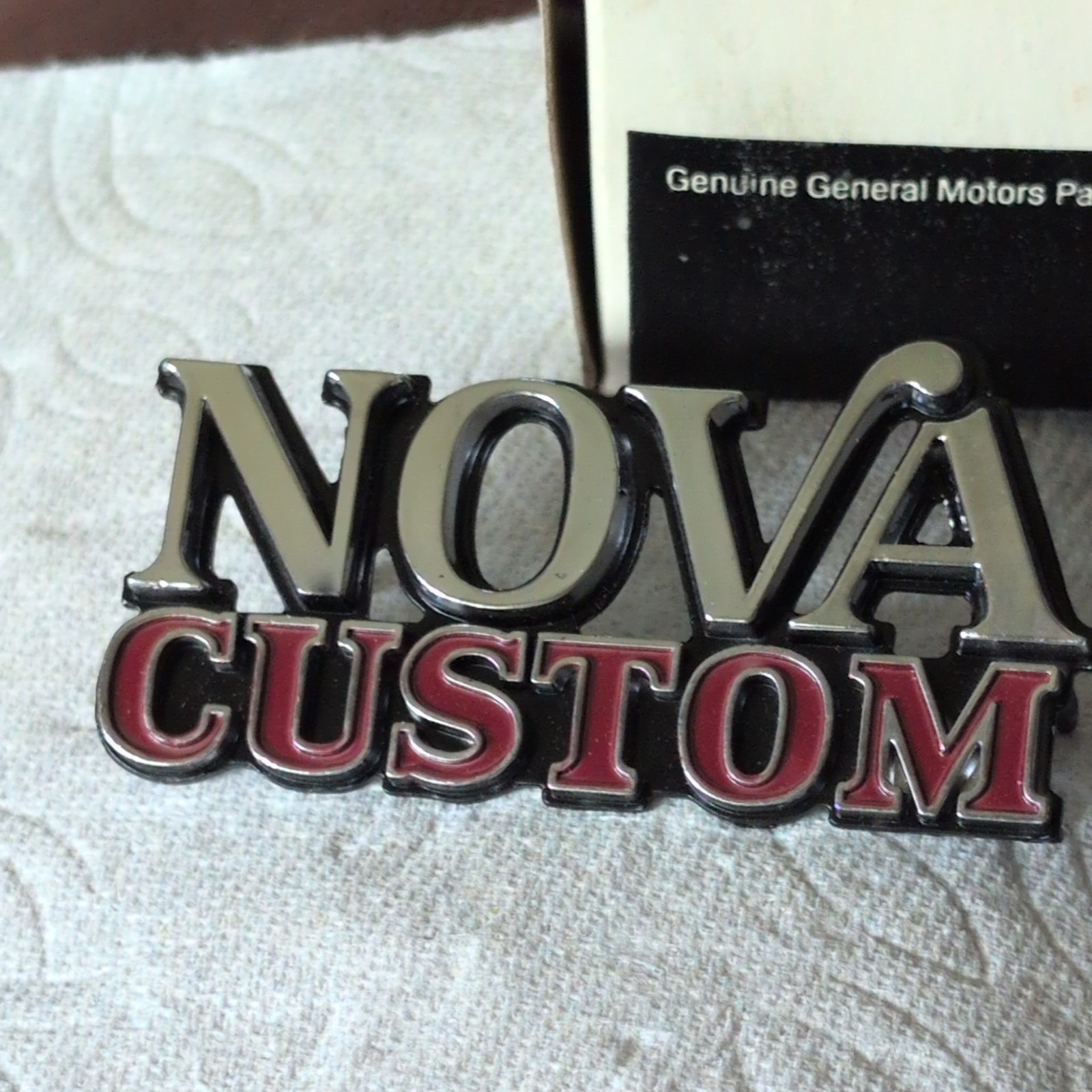 NOS GM 1975-1979 Chevy Nova Custom Fender Trunk Emblem 358755